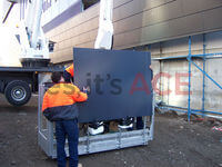 60 Metre Cherry Picker being used to install glass sheets