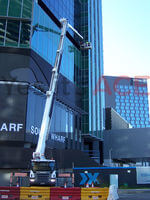 60 Metre Cherry Picker being used to install glass sheets