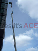 60 Metre Cherry Picker being used to install glass sheets