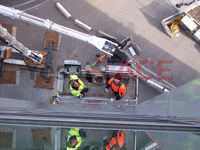 60 Metre Cherry Picker being used to install glass sheets