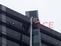 60 Metre Cherry Picker being used to install glass sheets